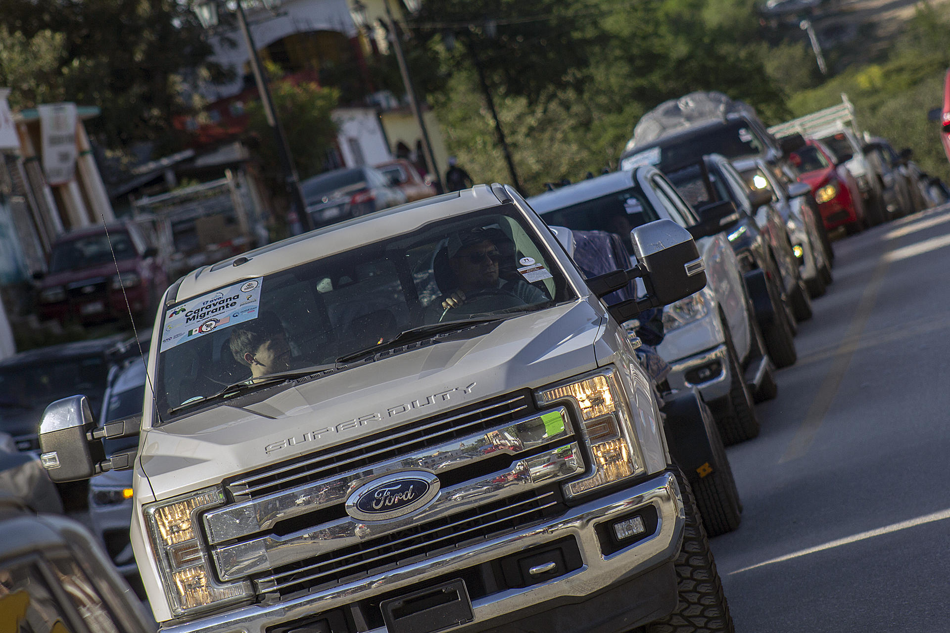 El centro de México recibe una caravana de paisanos migrantes que vuelven desde EE.UU.